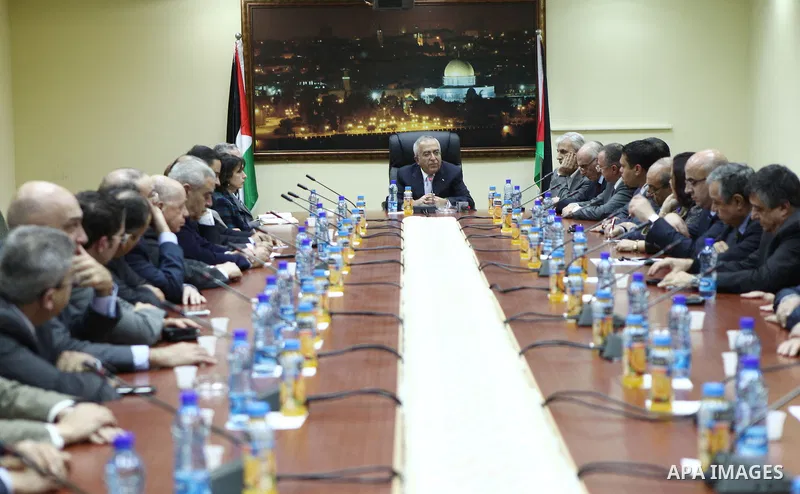 Palestinian prime minister Salam Fayyad, during a consultation meeting with Private sector institutions and business men, about the formation of new government, in the West Bank City of Ramallah on Feb. 22, 2011. Photo b...