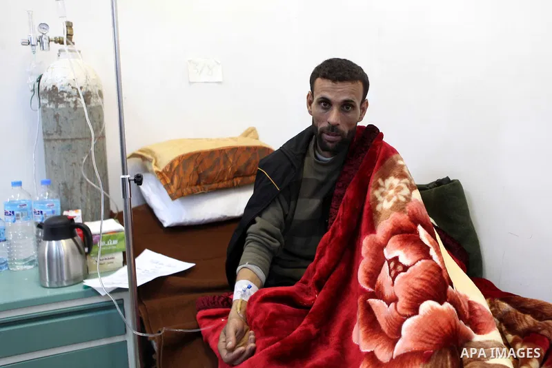 An injured anti-government protester receives treatment at a hospital in the eastern Libyan town of Derna on Feb. 23, 2011. Unrest shook Libya in recent days as government crackdowns on protesters have resulted in mass c...