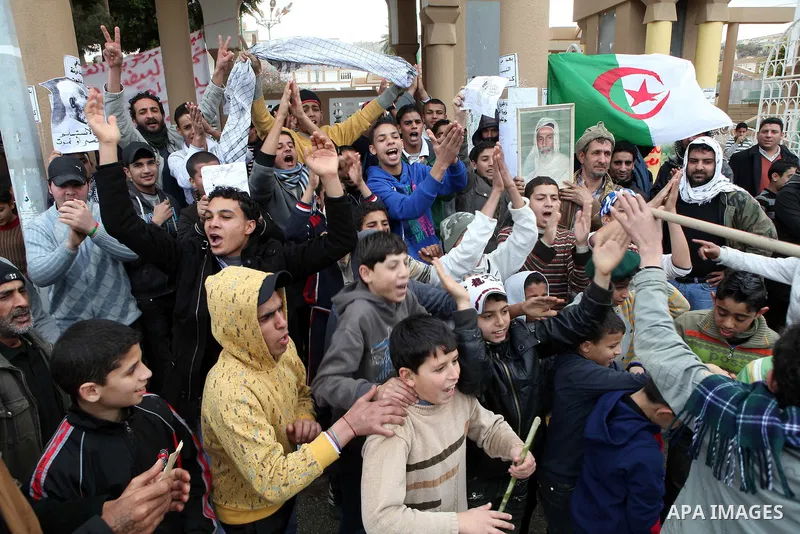 People attend a protest in the eastern Libyan town of Derna on Feb. 23, 2011. Unrest shook Libya in recent days as government crackdowns on protesters have resulted in mass casualties, according to human rights groups. P...