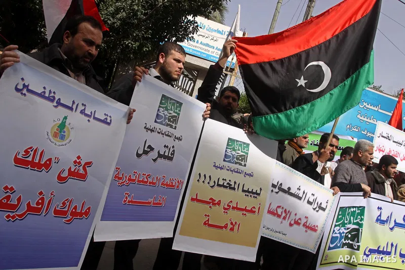 Palestinians take part in a protest to show solidarity with Libyan people, in Gaza city on Feb. 24, 2011. Photo by Mohammed Asad