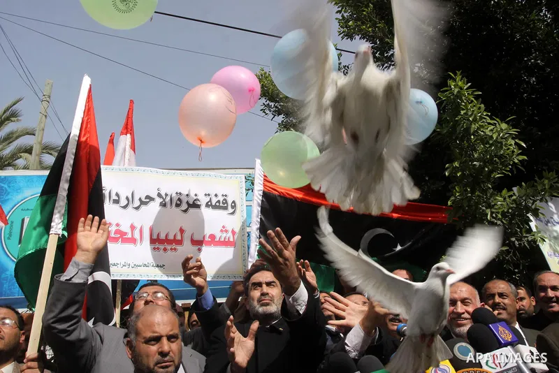 Palestinians take part in a protest to show solidarity with Libyan people, in Gaza city on Feb. 24, 2011. Photo by Mohammed Asad