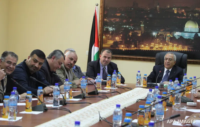 Palestinian prime minister Salam Fayyad, during a consultation meeting with representatives of the martyrs' families, about the formation of new government, in the West Bank City of Ramallah on Feb. 24, 2011. Photo by Mu...