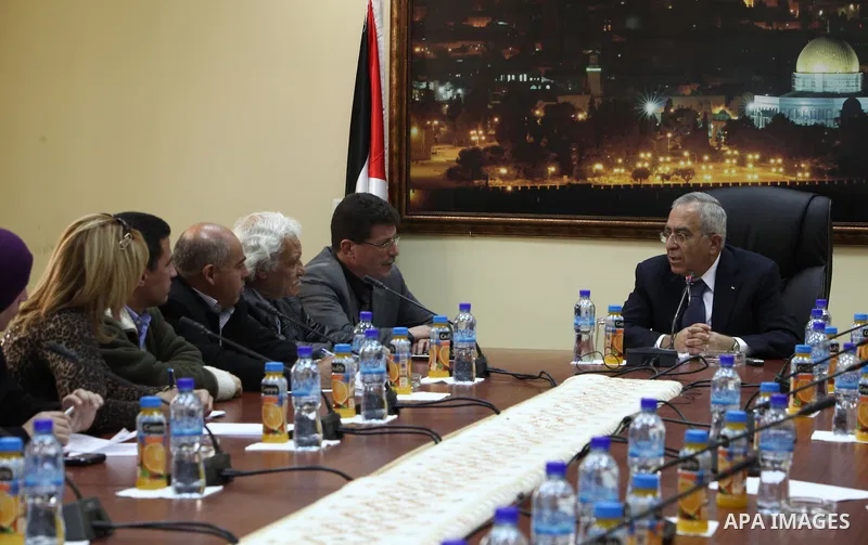 Palestinian prime minister Salam Fayyad, during a consultation meeting with defense organizations for Palestinian prisoners, about the formation of new government, in the West Bank City of Ramallah on Feb. 24, 2011. Phot...