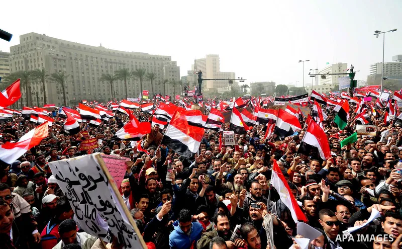 Egyptian protesters take part in a demonstration and Friday prayers in Tahrir Square, Cairo, Egypt, Friday, Feb. 25, 2011. Tens of thousands rallied in Cairo's Tahrir Square on Friday, trying to keep up pressure on Egypt...