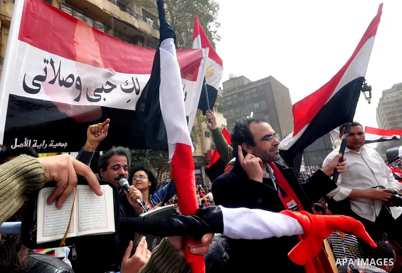 Egyptian protesters take part in a demonstration and Friday prayers in Tahrir Square, Cairo, Egypt, Friday, Feb. 25, 2011. Tens of thousands rallied in Cairo's Tahrir Square on Friday, trying to keep up pressure on Egypt...