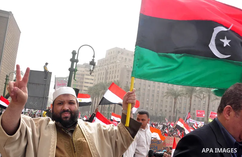Egyptian protesters take part in a demonstration and Friday prayers in Tahrir Square, Cairo, Egypt, Friday, Feb. 25, 2011. Tens of thousands rallied in Cairo's Tahrir Square on Friday, trying to keep up pressure on Egypt...