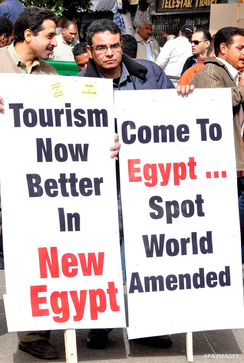 Egyptian protesters take part in a demonstration and Friday prayers in Tahrir Square, Cairo, Egypt, Friday, Feb. 25, 2011. Tens of thousands rallied in Cairo's Tahrir Square on Friday, trying to keep up pressure on Egypt...