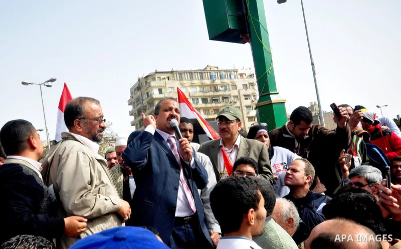 Egyptian protesters take part in a demonstration and Friday prayers in Tahrir Square, Cairo, Egypt, Friday, Feb. 25, 2011. Tens of thousands rallied in Cairo's Tahrir Square on Friday, trying to keep up pressure on Egypt...
