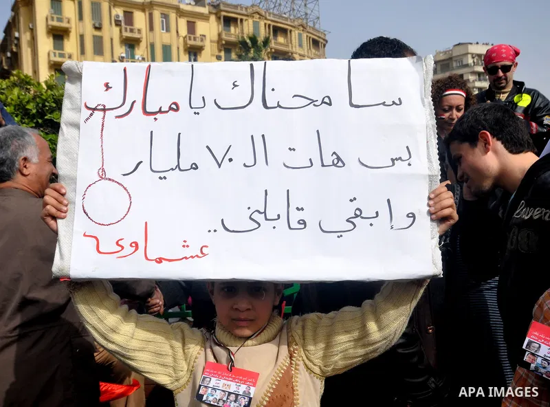 Egyptian protesters take part in a demonstration and Friday prayers in Tahrir Square, Cairo, Egypt, Friday, Feb. 25, 2011. Tens of thousands rallied in Cairo's Tahrir Square on Friday, trying to keep up pressure on Egypt...