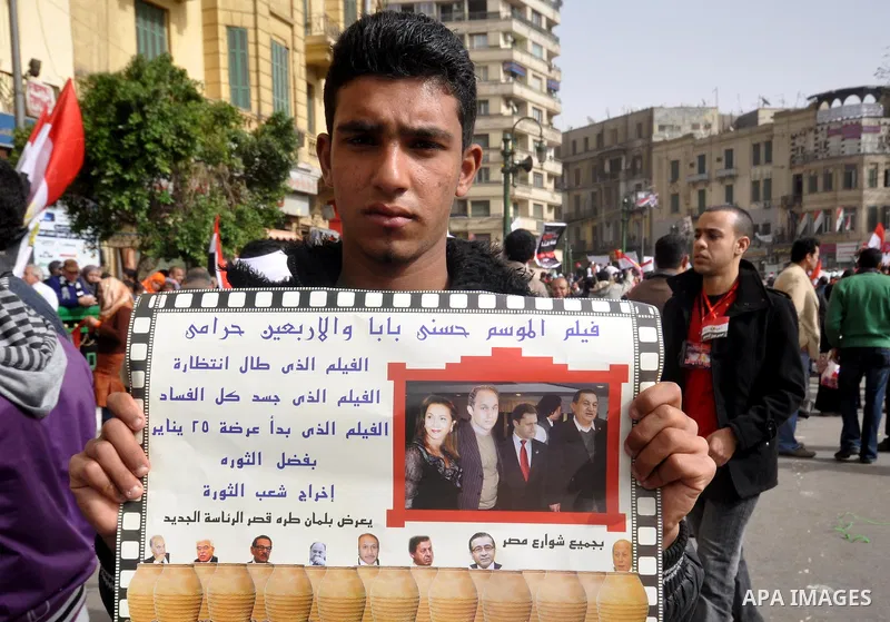 Egyptian protesters take part in a demonstration and Friday prayers in Tahrir Square, Cairo, Egypt, Friday, Feb. 25, 2011. Tens of thousands rallied in Cairo's Tahrir Square on Friday, trying to keep up pressure on Egypt...