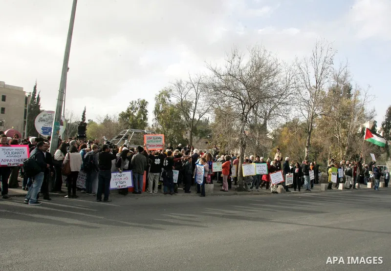 Israeli left-wing activists participate in a demonstration supporting Palestinians evicted from their homes in the east Jerusalem neighborhood of Sheikh Jarrah, Friday, Feb 25, 2011. Photo by Mahfuz Abu Turk