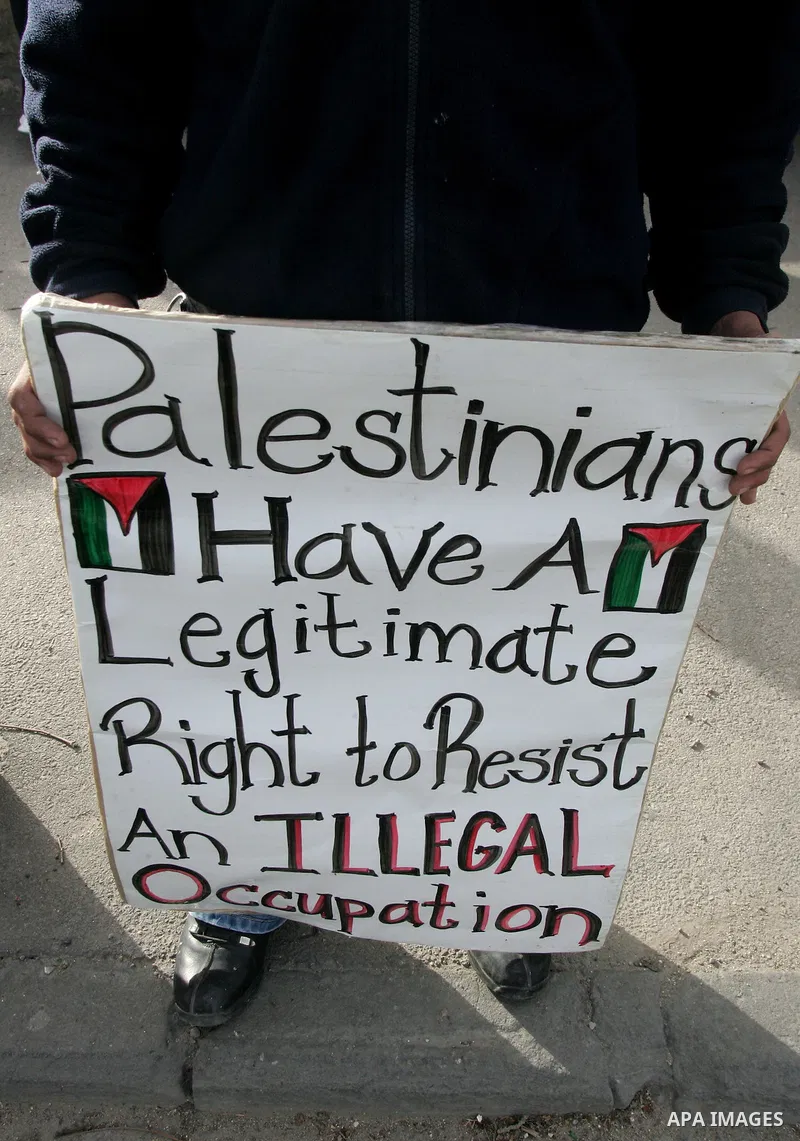 Israeli left-wing activists participate in a demonstration supporting Palestinians evicted from their homes in the east Jerusalem neighborhood of Sheikh Jarrah, Friday, Feb 25, 2011. Photo by Mahfuz Abu Turk