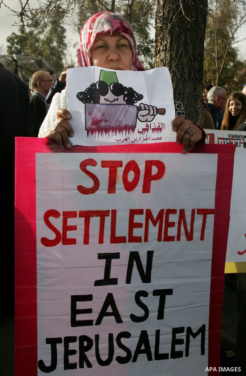 Israeli left-wing activists participate in a demonstration supporting Palestinians evicted from their homes in the east Jerusalem neighborhood of Sheikh Jarrah, Friday, Feb 25, 2011. Photo by Mahfuz Abu Turk