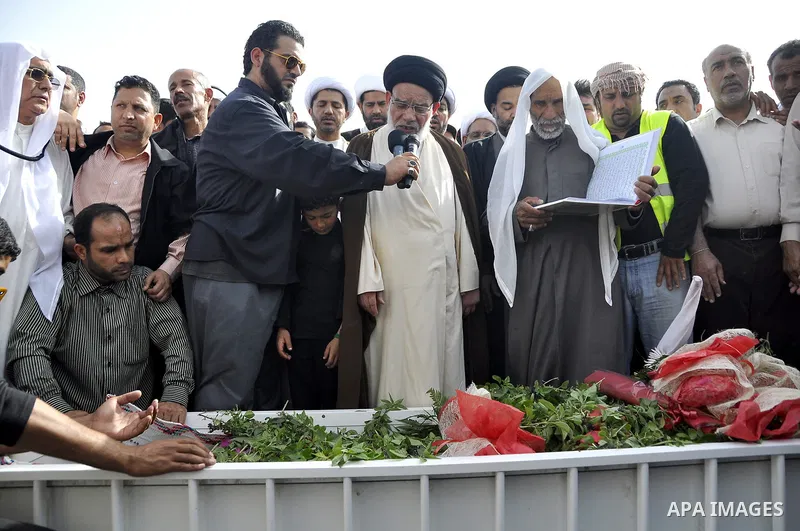 Anti-monarchy protesters and relatives accompany the coffin with the corpse of protester Abdul Redha Mohammed Hassan, 32, who was shot in the head by security forces while trying to march to Pearl Square, during the buri...