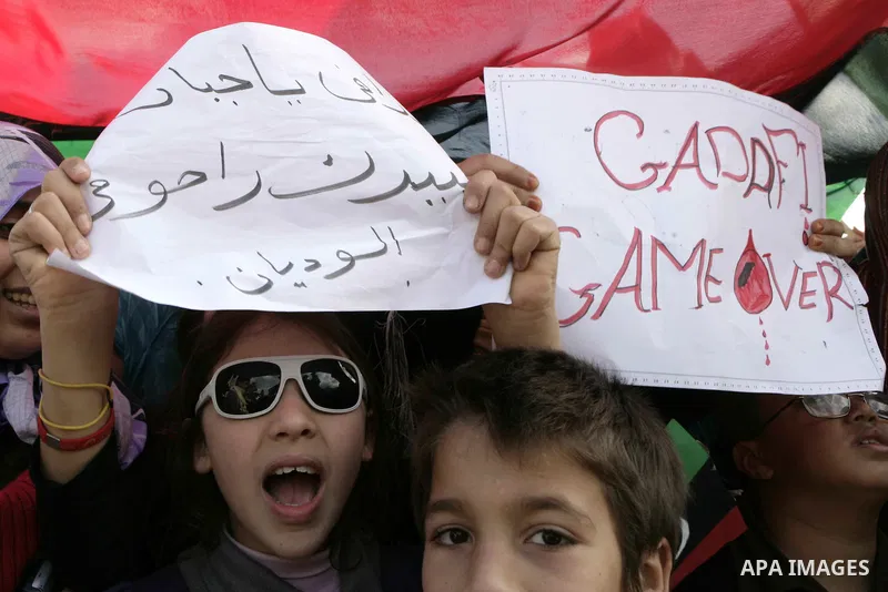 Libyan protesters demonstrate against Libyan leader Moammar Gadhafi during a rally at the Court Square in Derna, Libya, on Feb. 25, 2011. Photo by Karam Nasser