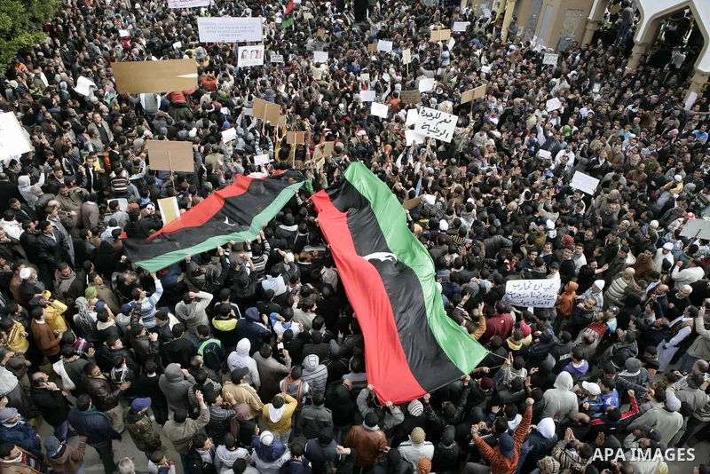 Libyan protesters demonstrate against Libyan leader Moammar Gadhafi during a rally at the Court Square in Derna, Libya, on Feb. 25, 2011. Photo by Karam Nasser