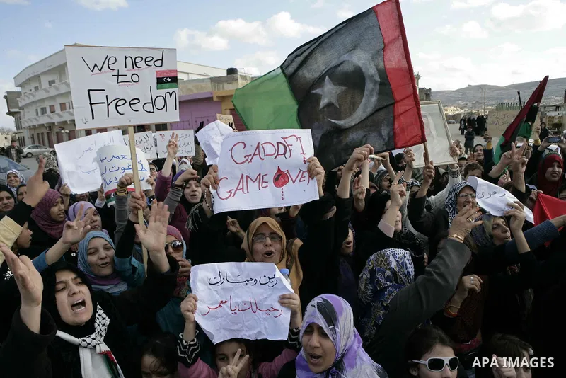 Libyan protesters demonstrate against Libyan leader Moammar Gadhafi during a rally at the Court Square in Derna, Libya, on Feb. 25, 2011. Photo by Karam Nasser