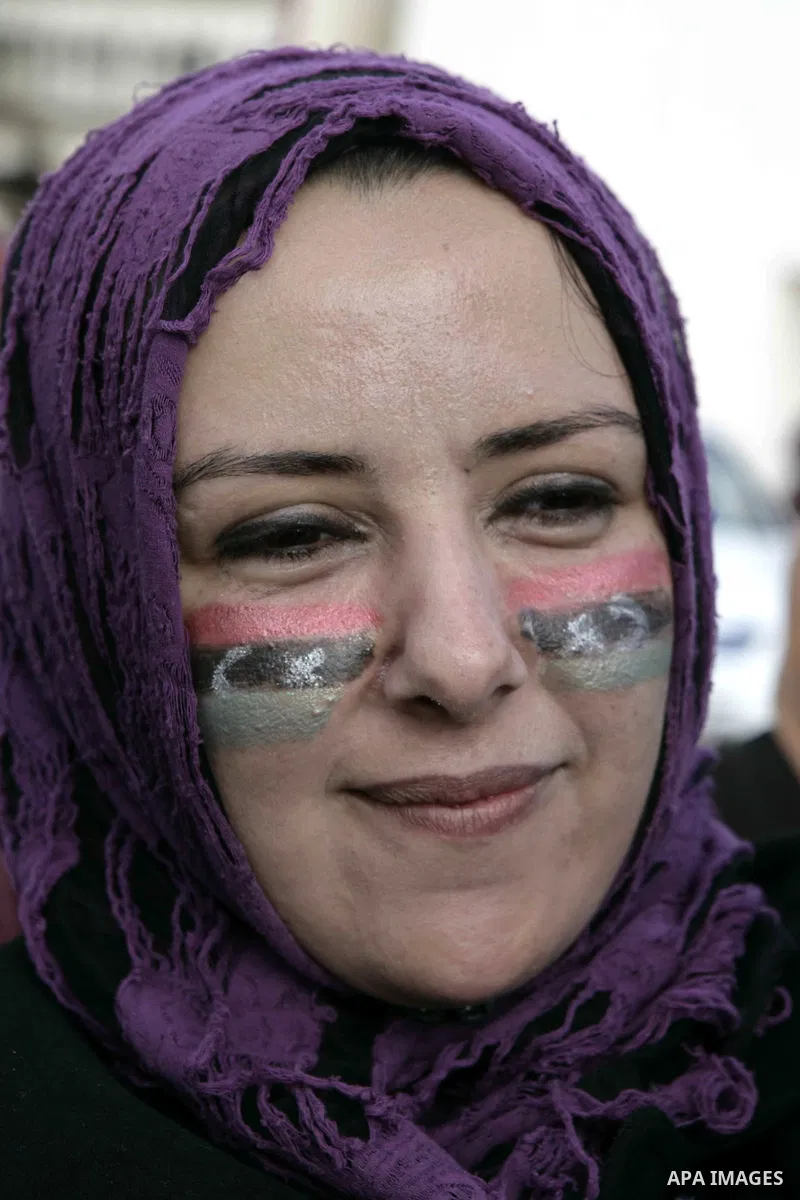 Libyan protester demonstrates against Libyan leader Moammar Gadhafi during a rally at the Court Square in Derna, Libya, on Feb. 25, 2011. Photo by Karam Nasser
