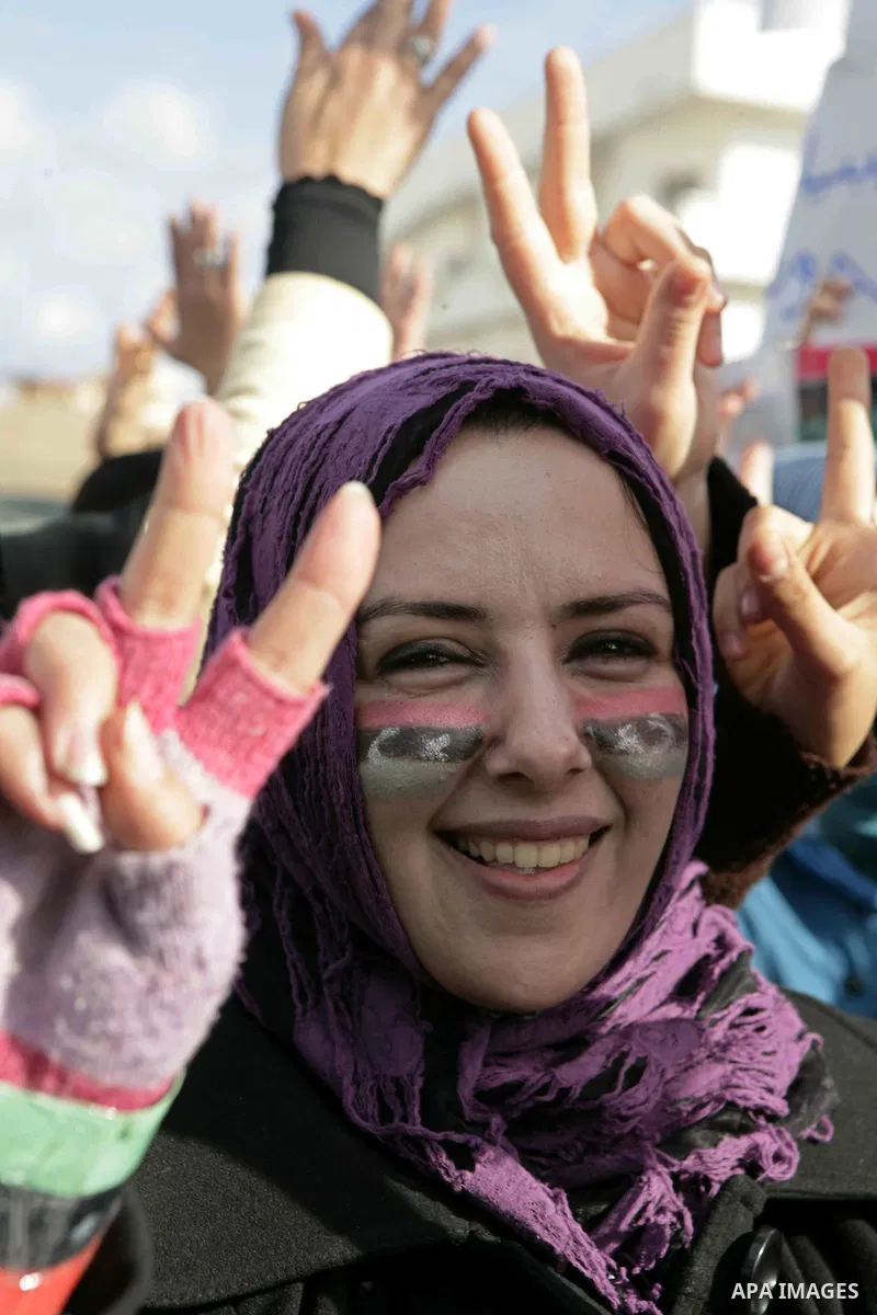 Libyan protester demonstrates against Libyan leader Moammar Gadhafi during a rally at the Court Square in Derna, Libya, on Feb. 25, 2011. Photo by Karam Nasser