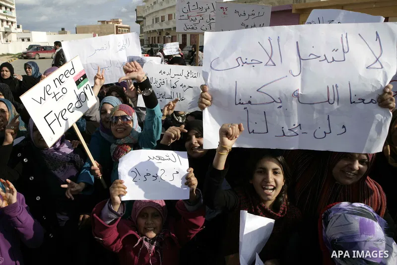 Libyan protesters demonstrate against Libyan leader Moammar Gadhafi during a rally at the Court Square in Derna, Libya, on Feb. 25, 2011. Photo by Karam Nasser