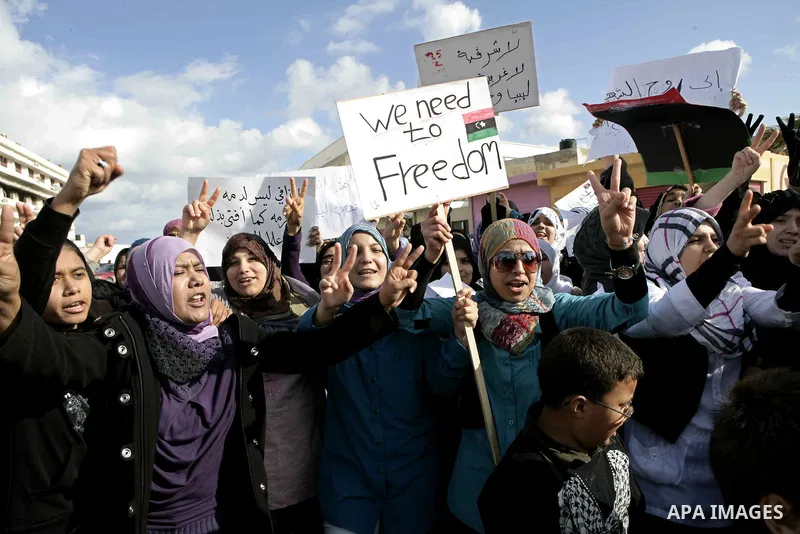 Libyan protesters demonstrate against Libyan leader Moammar Gadhafi during a rally at the Court Square in Derna, Libya, on Feb. 25, 2011. Photo by Karam Nasser