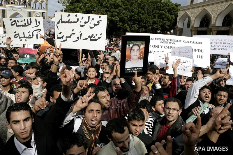 Libyan protesters demonstrate against Libyan leader Moammar Gadhafi during a rally at the Court Square in Derna, Libya, on Feb. 25, 2011. Photo by Karam Nasser