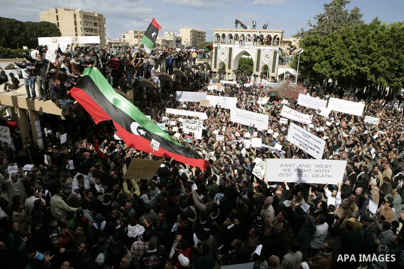 Libyan protesters demonstrate against Libyan leader Moammar Gadhafi during a rally at the Court Square in Derna, Libya, on Feb. 25, 2011. Photo by Karam Nasser