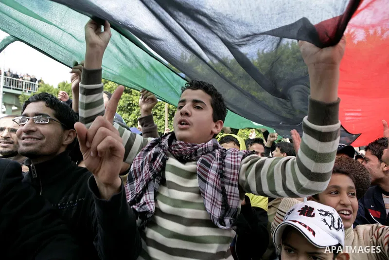 Libyan protesters demonstrate against Libyan leader Moammar Gadhafi during a rally at the Court Square in Derna, Libya, on Feb. 25, 2011. Photo by Karam Nasser