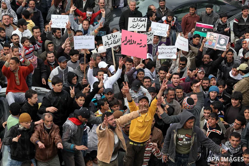 Libyan protesters demonstrate against Libyan leader Moammar Gadhafi during a rally at the Court Square in Derna, Libya, on Feb. 25, 2011. Photo by Karam Nasser