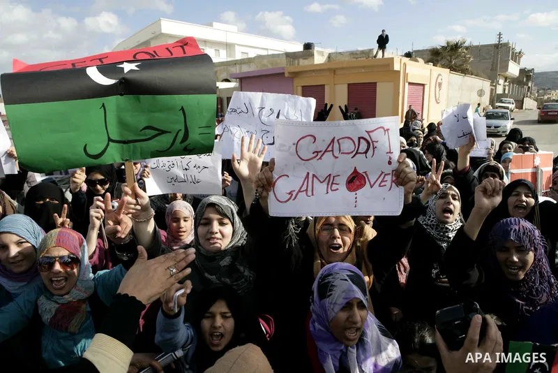 Libyan protesters demonstrate against Libyan leader Moammar Gadhafi during a rally at the Court Square in Derna, Libya, on Feb. 25, 2011. Photo by Karam Nasser