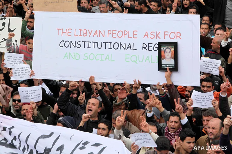 Libyan protesters demonstrate against Libyan leader Moammar Gadhafi during a rally at the Court Square in Derna, Libya, on Feb. 25, 2011. Photo by Karam Nasser