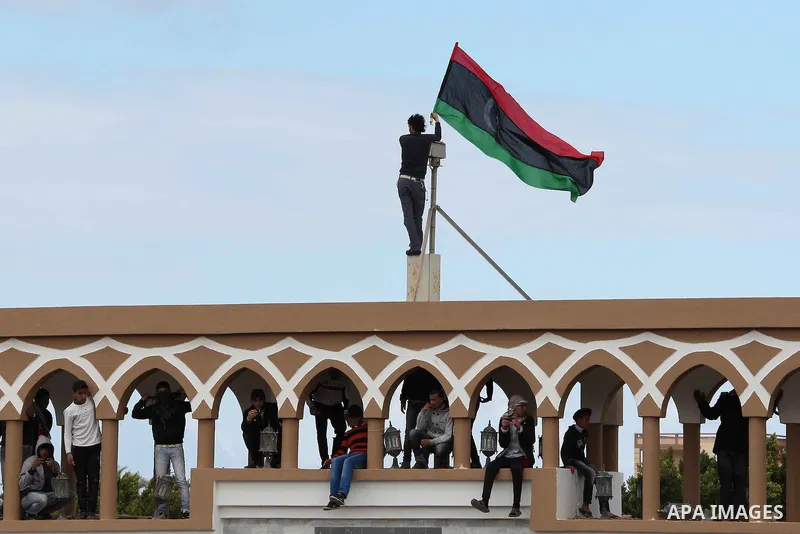 Libyan protesters demonstrate against Libyan leader Moammar Gadhafi during a rally at the Court Square in Derna, Libya, on Feb. 25, 2011. Photo by Karam Nasser
