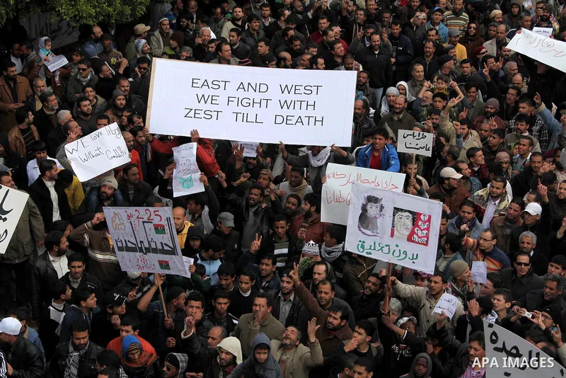 Libyan protesters demonstrate against Libyan leader Moammar Gadhafi during a rally at the Court Square in Derna, Libya, on Feb. 25, 2011. Photo by Karam Nasser
