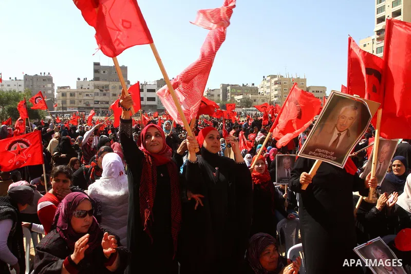 Palestinian supporters of the Democratic Front for the Liberation of Palestine (DFLP) carry flags during a rally celebrating 42 years since its founding in Gaza City, Saturday, Feb. 26, 2011. Founded in 1969 the DFLP is...