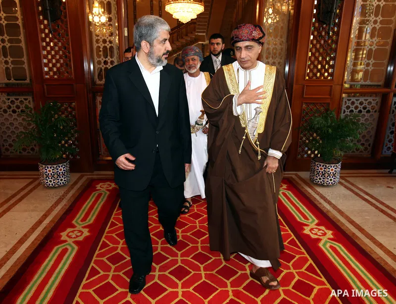 Palestinian Hamas leader Khaled Meshaal, (L), during a meeting the deputy prime minister of the Sultanate of Oman, Fahd bin Mahmoud al Said, (R), in Sultanate of Oman on Feb. 26, 2011. Photo by Majd Majd