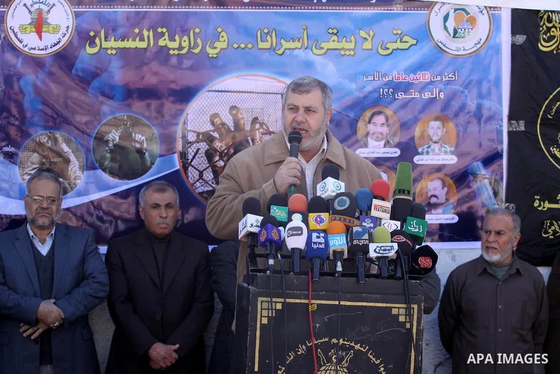 Palestinians take part in a protest organized by Islamic Jihad movement calling for the release of Palestinian prisoners from Israeli jails at the Red Cross office in Gaza City on Feb. 28, 2011. Photo by Mohammed Asad