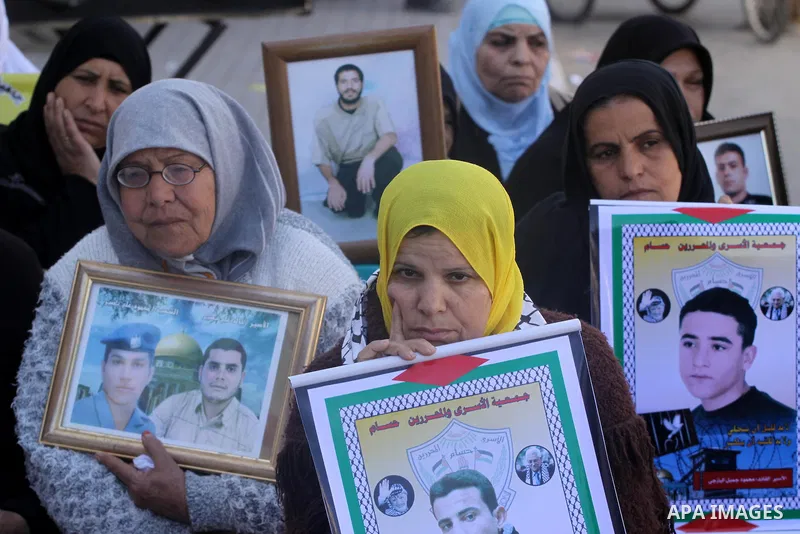 Palestinian women take part in a protest organized by Islamic Jihad movement calling for the release of Palestinian prisoners from Israeli jails at the Red Cross office in Gaza City on Feb. 28, 2011. Photo by Mohammed As...