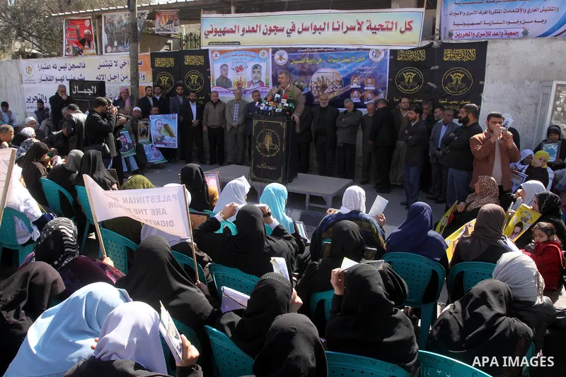 Palestinians take part in a protest organized by Islamic Jihad movement calling for the release of Palestinian prisoners from Israeli jails at the Red Cross office in Gaza City on Feb. 28, 2011. Photo by Mohammed Asad