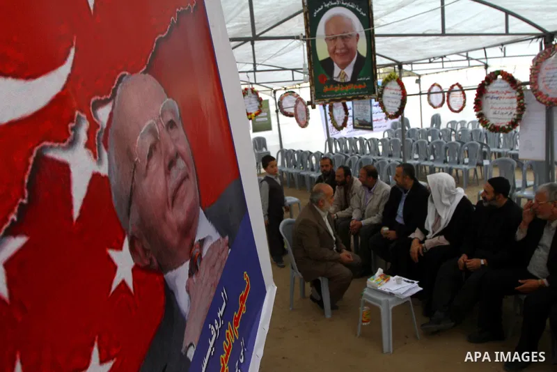 Palestinians offer the condolences on the death of the Turkish leader, Necmettin Erbakan in Gaza city on Feb. 28,2011. Photo by Ashraf Amra