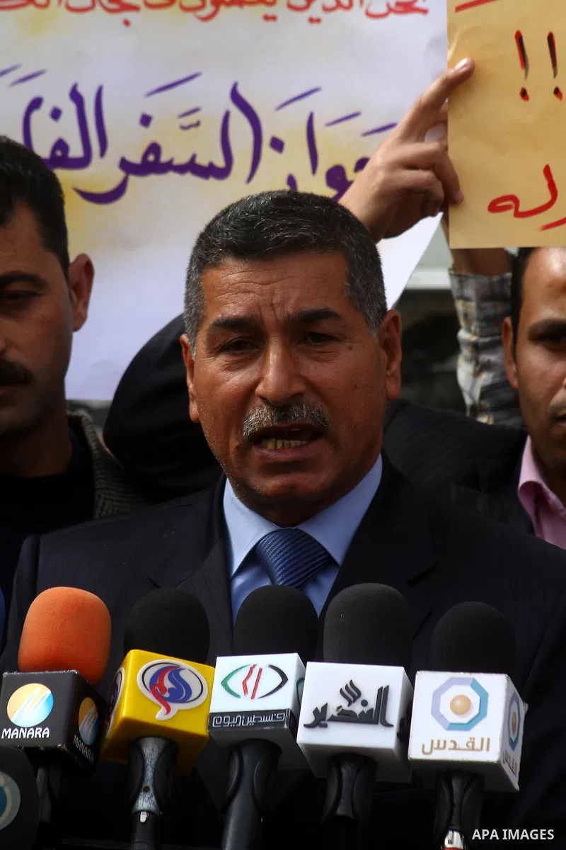Palestinians take part in a rally calling Fayyad's Government in Ramallah to return their salaries in Gaza city, Tuesday, March 1, 2011. Photo by Ashraf Amra