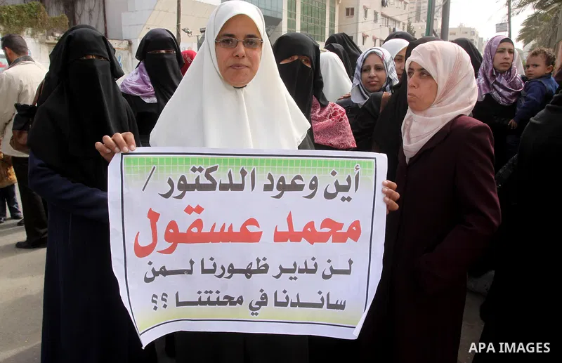 Palestinian teachers take part in a rally in front of the Palestinian Legislative Council headquarters calling the government for jobs in Gaza city on March 1,2011 . Photo by Mohammed Asad