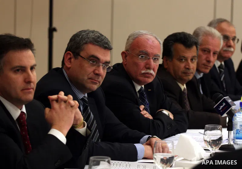 Palestinian Foreign Minister, Riyad al-Malki and the Romanian Foreign Minister, Teodor Baconschi attend a meeting in the West Bank city of Ramallah on March 1, 2011. Photo by Issam Rimawi