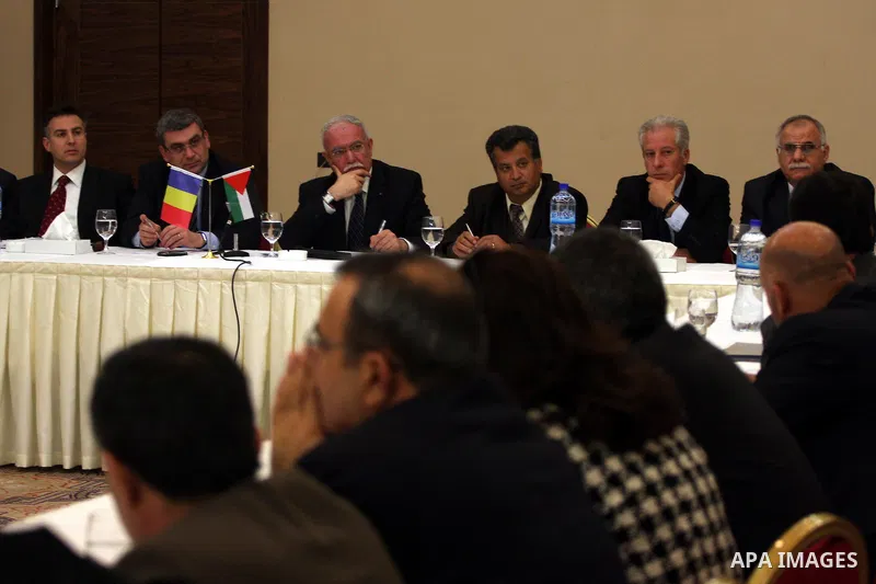 Palestinian Foreign Minister, Riyad al-Malki and the Romanian Foreign Minister, Teodor Baconschi attend a meeting in the West Bank city of Ramallah on March 1, 2011. Photo by Issam Rimawi