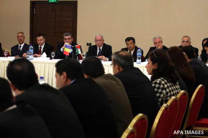 Palestinian Foreign Minister, Riyad al-Malki and the Romanian Foreign Minister, Teodor Baconschi attend a meeting in the West Bank city of Ramallah on March 1, 2011. Photo by Issam Rimawi