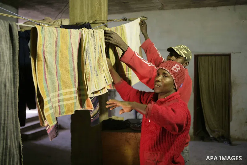 African migrant workers living in miserable conditions in Benghazi March 1, 2011. African workers fear attacks from Libyans hunting for alleged mercenary fighters. Wealthier Western and Asian states have sent ships to ev...