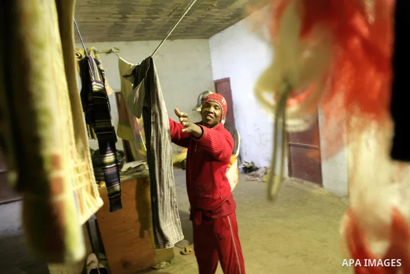 African migrant workers living in miserable conditions in Benghazi March 1, 2011. African workers fear attacks from Libyans hunting for alleged mercenary fighters. Wealthier Western and Asian states have sent ships to ev...