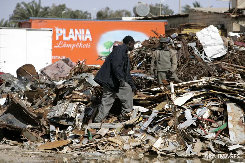 African migrant workers living in miserable conditions in Benghazi March 1, 2011. African workers fear attacks from Libyans hunting for alleged mercenary fighters. Wealthier Western and Asian states have sent ships to ev...