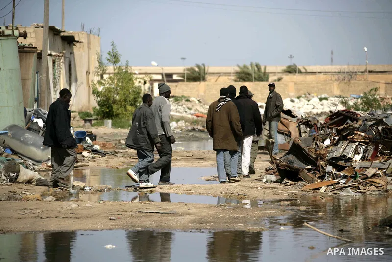 African migrant workers living in miserable conditions in Benghazi March 1, 2011. African workers fear attacks from Libyans hunting for alleged mercenary fighters. Wealthier Western and Asian states have sent ships to ev...