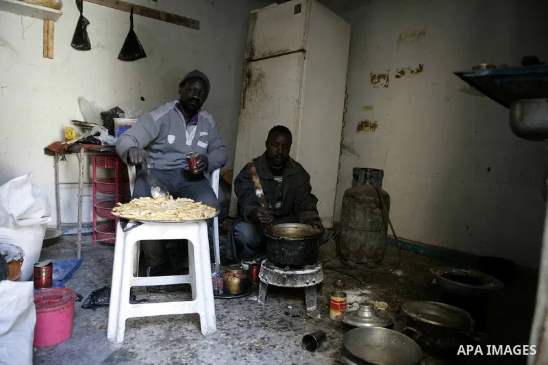 African migrant workers living in miserable conditions in Benghazi March 1, 2011. African workers fear attacks from Libyans hunting for alleged mercenary fighters. Wealthier Western and Asian states have sent ships to ev...