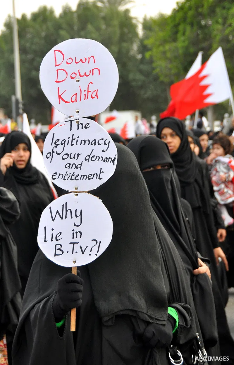Bahraini protesters march in the capital Manama, Bahrain, 01 March 2011. Thousands of protesters took part in an opposition rally from within the capital Manama, Bahrain to Lulu Square to renew demands for removing the g...